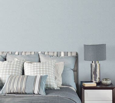 bedroom with blue weave texture wallpaper